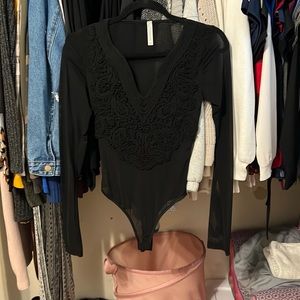 Sheer black bodysuit